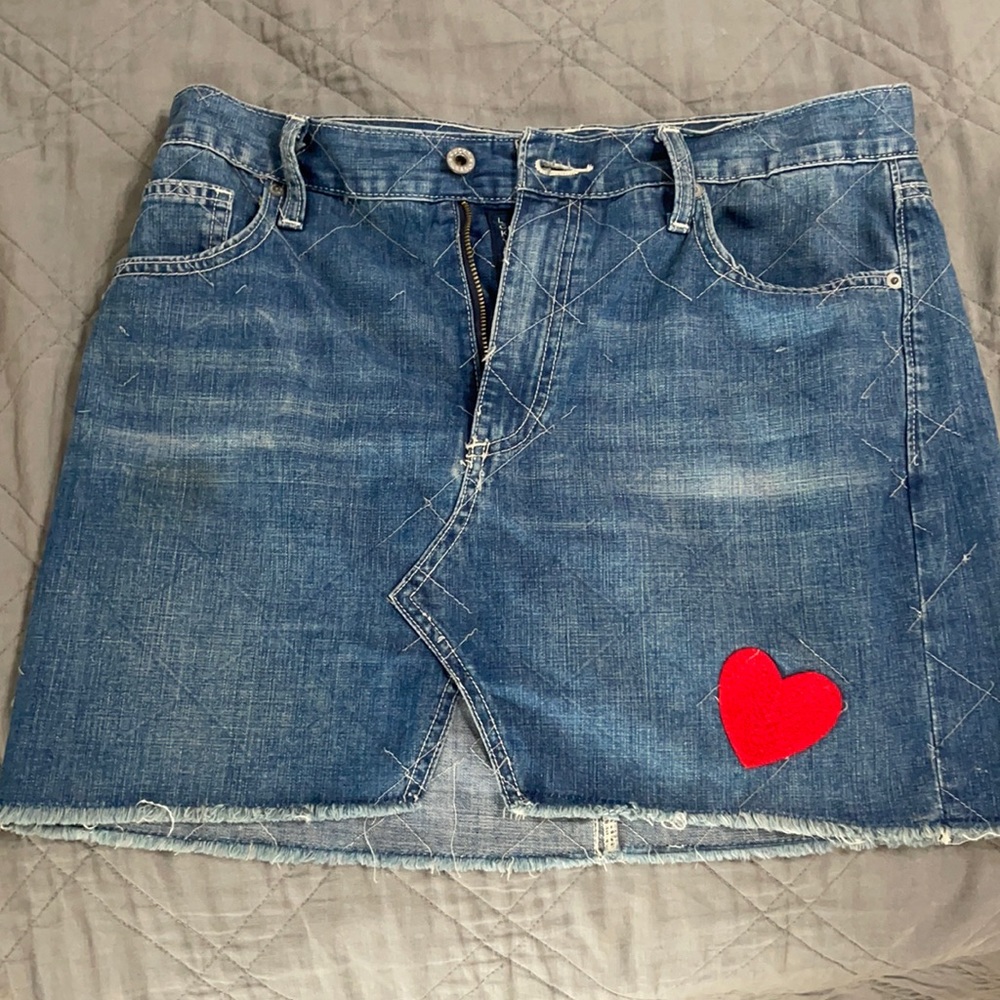 Lucky brand blue Jean skirt with heart. Size 8.